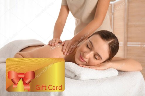 Massage therapist holding a sign promoting a special offer